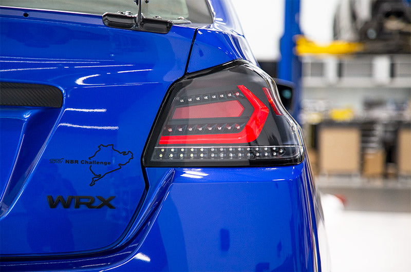 OLM Evolution Tail Lights Clear Lens, Black Base, Red Bar 2015-2021 WRX / STI
