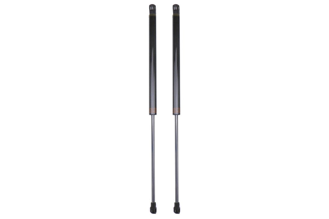 OLM Black Carbon Fiber Hood Dampers 2015-2025 WRX / STI - OLMHDP-WRX14-CF - Subimods.com