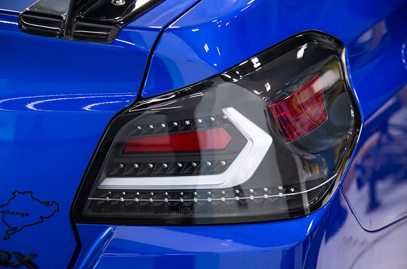 OLM Evolution Tail Lights Clear Lens, Black Base, White Bar 2015-2021 WRX / STI - OLMA.70032.1-B - Subimods.com