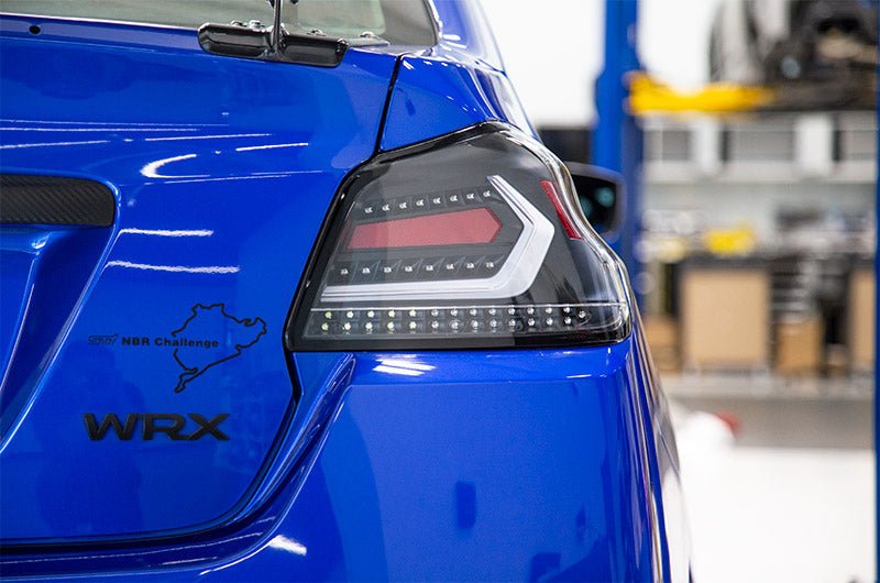 OLM Evolution Tail Lights Clear Lens, Black Base, White Bar 2015-2021 WRX / STI - OLMA.70032.1-B - Subimods.com