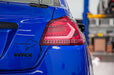 OLM Evolution Tail Lights Clear Lens, Red Base, White Bar 2015-2021 WRX / STI - OLMA.70032.1-R - Subimods.com