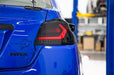OLM Evolution Tail Lights Smoked Lens, Black Base, White Bar 2015-2021 WRX / STI - OLMA.70032.1-SB - Subimods.com
