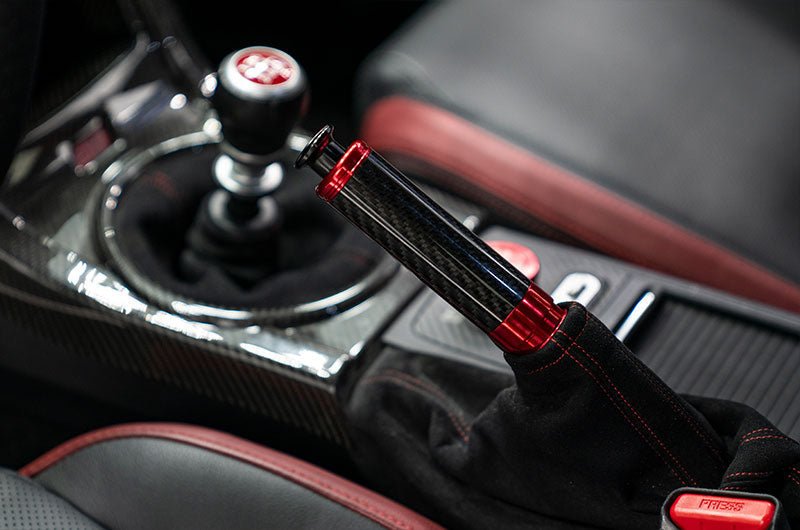 OLM Signature Series E-Brake Handle Black Carbon w/ Red 15-21 WRX / STI / 13-25 BRZ / FRS / 86 - OLMA.70217.1-RD - Subimods.com