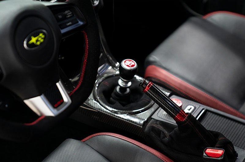 OLM Signature Series E-Brake Handle Black Carbon w/ Red 15-21 WRX / STI / 13-25 BRZ / FRS / 86 - OLMA.70217.1-RD - Subimods.com