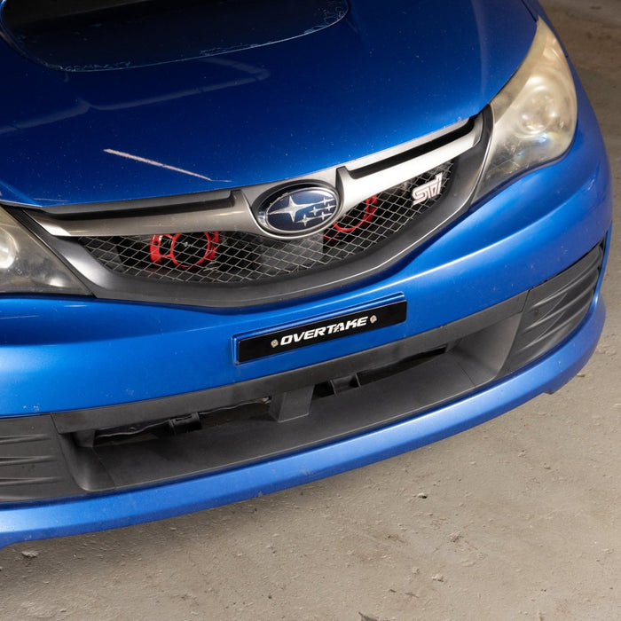 Overtake License Plate Delete Black Universal - Holes 7" Apart - A10540 - Subimods.com