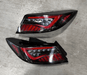 (Scratch and Dent) Molded Innovations EVO+ Style Sequential LED Tail Lights Clear Lens w/ Black Base & Red Bar 2022-2026 BRZ / 2022-2026 GR86 - MI-SB2003-CBRCR-SAD-1368 - Subimods.com