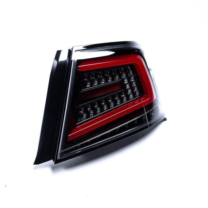 Spec-D Optic Style Sequential LED Tail Lights Gloss Black Housing w/ Clear Lens and Red Bar 2008-2014 WRX Sedan / 2011-2014 STI Sedan - LT-WRX084BKLED-SQ-TM - Subimods.com