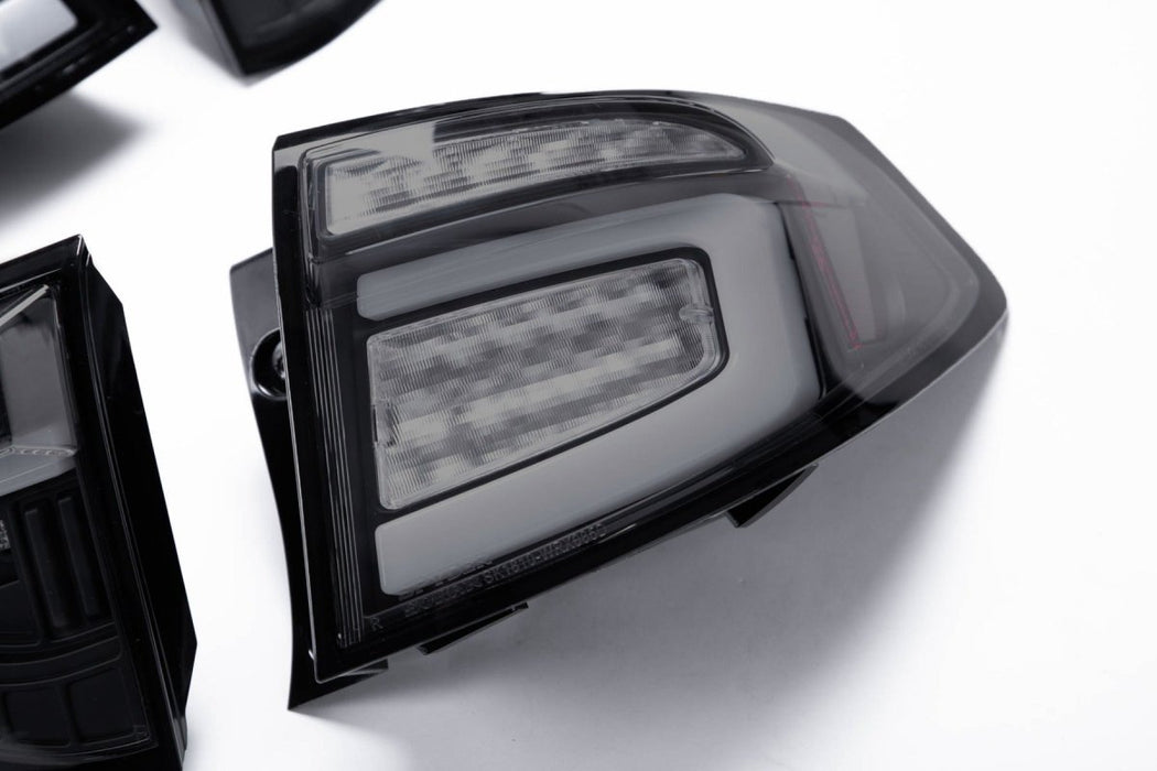 Spyder Sequential LED Tail Lights Black Housing w/ Smoke Lens and White Bar 2008-2014 WRX Hatchback / 2011-2014 STI Hatchback - 5086747 - Subimods.com